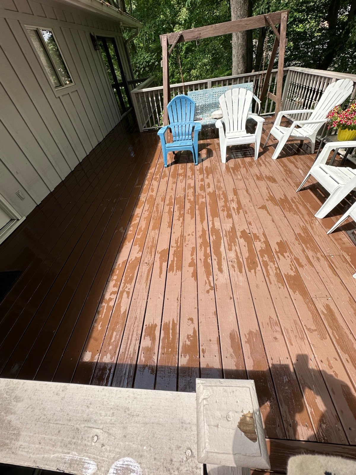 Wood deck after cleaning, restored natural wood tone