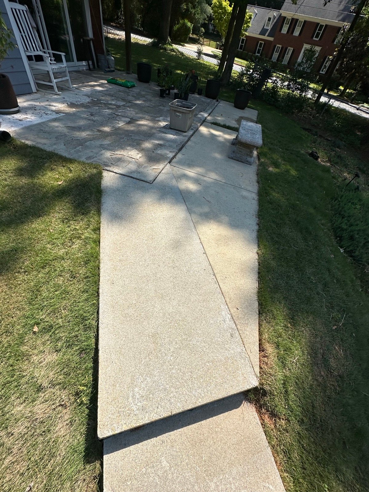 Backyard patio and walkway after cleaning, clean and even